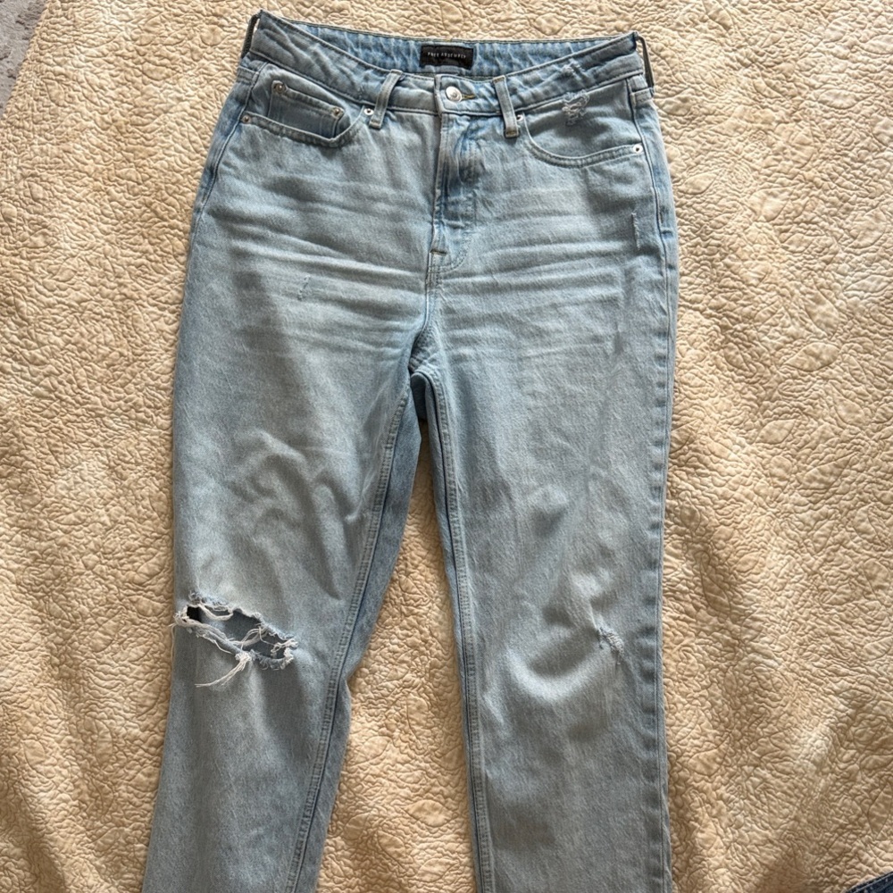Women's Light Blue Straight Leg Jeans with Distressed Knee